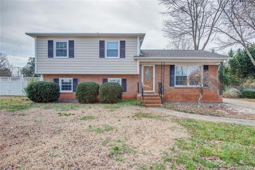 Love to entertain? Looking for room to spread out? This is your home! Open floor plan w/huge great room w/FP, oversized kitchen with pantry, ample countertop and cabinet space. Spacious living room/den in lower level with large bath and easy access to the beautiful custom in-ground pool. Large fenced yard, oversized two car garage with work area. Extra parking. Lots of sq. ft for price. New plumbing, pool pump, breaker box, attic fan per seller.  Flat .36ac lot. Easy access to I-85. No HOA!