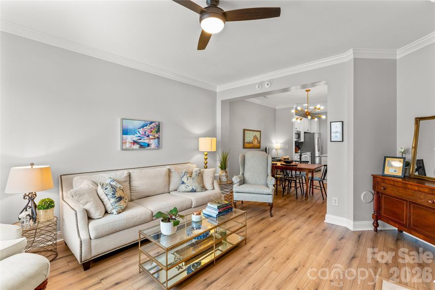 SECOND CHANCE OPPORTUNITY! Tucked into the heart of Historic Wesley Heights, this modern 2-bedroom, 2.5-bath townhome truly has it all. The main level welcomes you with new honey oak luxury vinyl flooring, fresh neutral paint, and an abundance of natural light. The renovated kitchen shines with white quartz countertops, crisp white cabinetry, updated fixtures and functional island ideal for gathering or enjoying a quick meal.

The upper level showcases a private guest suite including an updated vanity, hallway access to a conveniently located laundry closet, and a spacious primary retreat with vaulted ceilings, a custom walk-in closet system, and a refreshed bath highlighted by a granite double vanity.

Step outside to a fully fenced backyard with low maintenance patio pavers that boarder secluded woods—perfect for relaxing and entertaining. Neighborhood access to the Stewart Creek Greenway - a direct route to the Panther’s Stadium. Walking distance to Rhino Market, Town Brewing, Not Just Coffee and an array of other vibrant dining, shopping, and neighborhood favorites. With mature trees, Charleston style neighborhood charm, and quick access to Uptown, South End, and Charlotte Douglas International Airport, this townhome checks every box for connected, low-maintenance living.

Main level flooring 2026, HVAC 2025, Furnace 2023, Roof 2025 Water Heater 2019. Previous buyer’s preferences changed. No inspection concerns and appraised over list price.