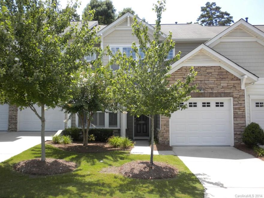 Fantastic townhome in sought after Tega Cay located on the 8th fairway.  This lovely home has 2 master suites, one on each floor and a huge loft area overlooking the 2 story great room with gas log fireplace. Hardwood flooring throughout the main floor, corian counters and well fitted kitchen, refrigerator to remain. 
Enjoy the good life in this great home.