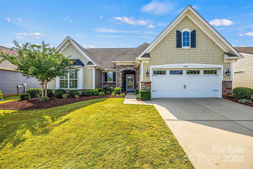 This home inside the Tree Tops neighborhood, a 55+ active adult community, offers you the dreamy lifestyle you have been searching for! As you pull up to the home, you will notice the front of the home overlooks a gorgeous, manicured pocket park. Upon entering the home, you are welcomed by a spacious, bright open floor plan that flows perfectly and provides ample room to host family and friends for a simple card night or a bountiful holiday gathering. The fireplace in the family room sets the cozy backdrop to relaxing evenings. The roomy kitchen overlooks the family room, providing ample counter space and storage. The screened-in back porch is the ideal space to share some sweet tea with your friendly neighbors. The resort-style amenities are nestled into a natural setting along the 10 acre lake. The beauty of this home is enriched by the warmth and friendliness of this amenity-rich community. Activities galore when wanted; peace and quiet when needed.