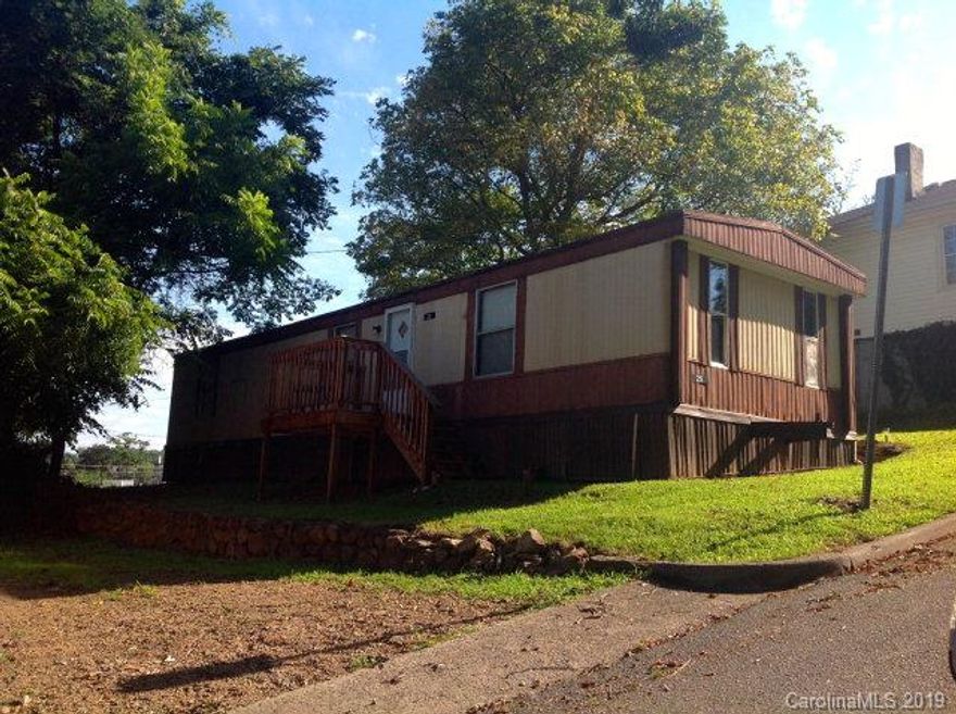 Singlewide on city lot - paved street - currently rented