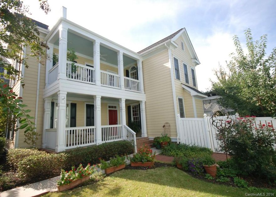 Truly a unique home in Baxter Village. Interior features include hardwoods on main and upper levels, custom built-ins, granite counters with 42" cabinets in kitchen, heavy moldings, Rinnai tankless water heater and Bose surround system. Exterior features include new roof in 2011, double front porches, custom landscaping, and an amazingly quiet and private outdoor living area with stone fireplace that must be seen to fully appreciate. All moments from the town center, I77 and other amenities.
