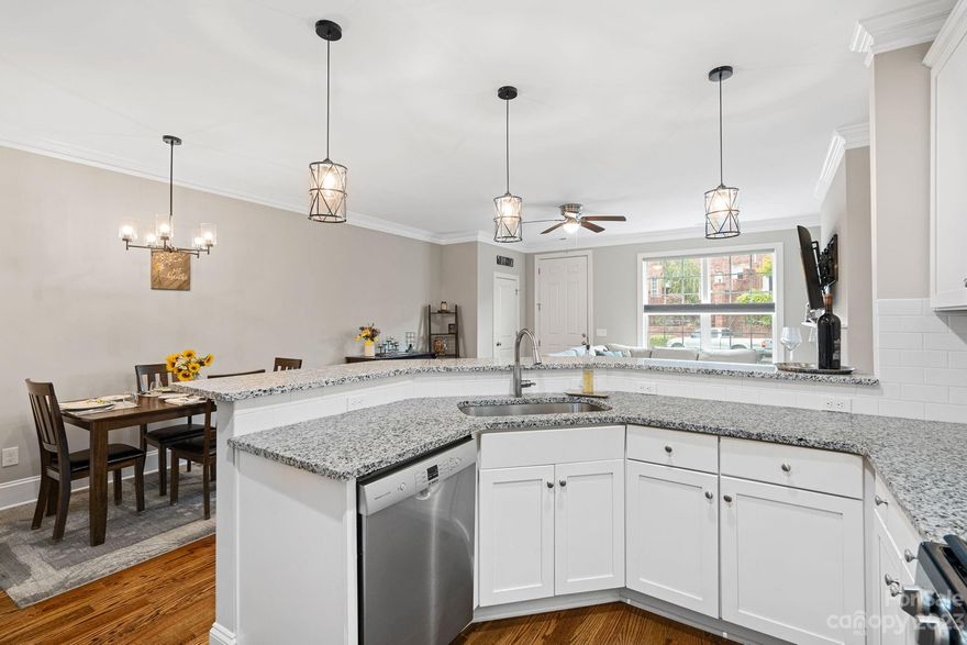 Welcome to the newest townhome available in Afton Village. This full-brick home has all the updates you’re looking for. Open floorplan with a beautiful, bright kitchen - white cabinets, gas stove with hood and Luna Pearl granite countertops. Hardwood floors, eat-in kitchen, designated pantry and breakfast bar make for convenient living. The primary suite is downstairs with an ensuite bathroom, walk-in closet and tiled shower. Two spacious bedrooms upstairs and loft area to fit your needs. This home also has plenty of closets and storage space. The private courtyard between the house and garage has a covered breezeway and provides the perfect space for relaxing, gardening or dining. Afton Village is a pedestrian-friendly community hosting Dorton Park with tennis courts, disc golf, playground and other amenities. Also a short walk to local recreation center, Afton Run Greenway and lots of local shopping, dining and entertainment. You’ll love living in this thriving, modern neighborhood.