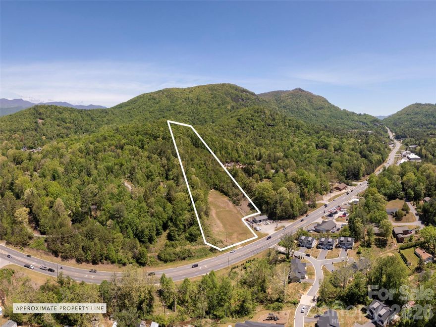 Prime retail or mixed use development site located along US 74A just a short distance off I-40/I-240 (exit 53) & the Blue Ridge Parkway! This "gateway" link connects Fairview, Chimney Rock and Lake Lure with greater Asheville. Road frontage of ~139' along US 74A widens to ~278' a short distance into the site with more than 50% of the site zoned CS (~955' depth) while the remainder (wooded) site extends another ~615' (depth) increasing in elevation to a wooded plateau @ ~2410 elevation! Size & shape are conducive to split retail & residential use similar to other surrounding land uses along the corridor; sweeping, long range southern mountain view are a bonus! Utilities available!