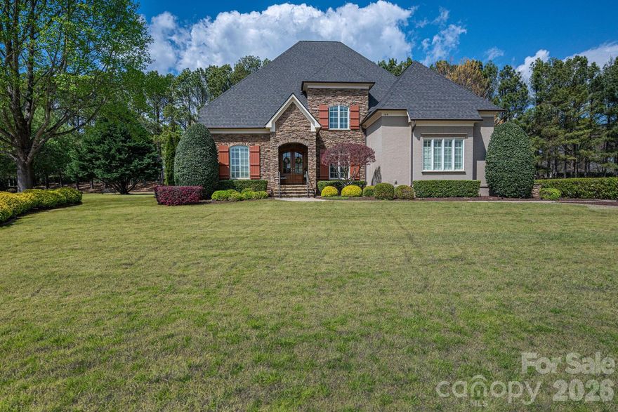 Experience the perfect blend of privacy and sophisticated style in this stunning 4,600 SF residence,
nestled within the prestigious waterfront community of The Point. This home has been meticulously
maintained and thoughtfully updated, offering ultimate peace of mind with a new roof (2024) & water
heater (2024). Please see attachments with a list of updates.
At the heart of the home, the chef-inspired kitchen features a striking new quartzite island, creating a
natural focal point for the open-concept main level and Great Room. Designed for a versatile lifestyle,
the floor plan includes an upstairs bonus room and a separate media room—the
perfect retreat for movie nights.
The main level primary suite is a sanctuary of comfort, boasting new hardwood floors that extend throughout
the entire upper level. Secondary bedrooms feature new carpeting, while the remodeled
secondary baths impress with custom-designed tile showers. All bedrooms have their own ensuite bathrooms.
Outdoor living area includes an electronically screened covered porch, outdoor speakers, stone fireplace, sink, mini-refrigerator and bar area with a new quartz countertop.

Life at The Point isn't complete without the water.  This property includes a deeded right to use a boat
slip (Z Dock #47, END SLIP), featuring an overabundance of parking for stress-free lake days. Enjoy an
unparalleled lifestyle just minutes from world-class amenities in Mooresville’s most sought-after
neighborhood.