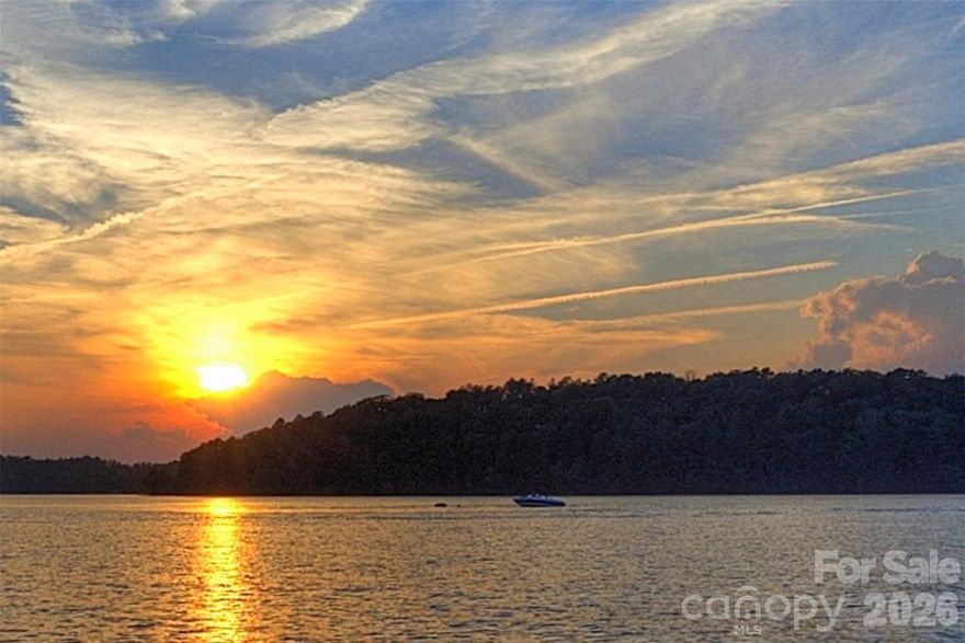 Nestled on Badin Lake in the private community of Uwharrie Point, home of the Old North State Golf Club rated as one of America’s Best Private Golf Courses, rests your waterfront retreat. This gently sloping home site with 115 feet of water frontage is situated near the #5 Tee Box and marina.  Frame the picturesque view with the home that inspires you. Close enough but yet far enough away. Within one hour from Charlotte, Greensboro, Winston-Salem, and Pinehurst. A Sustaining Value.