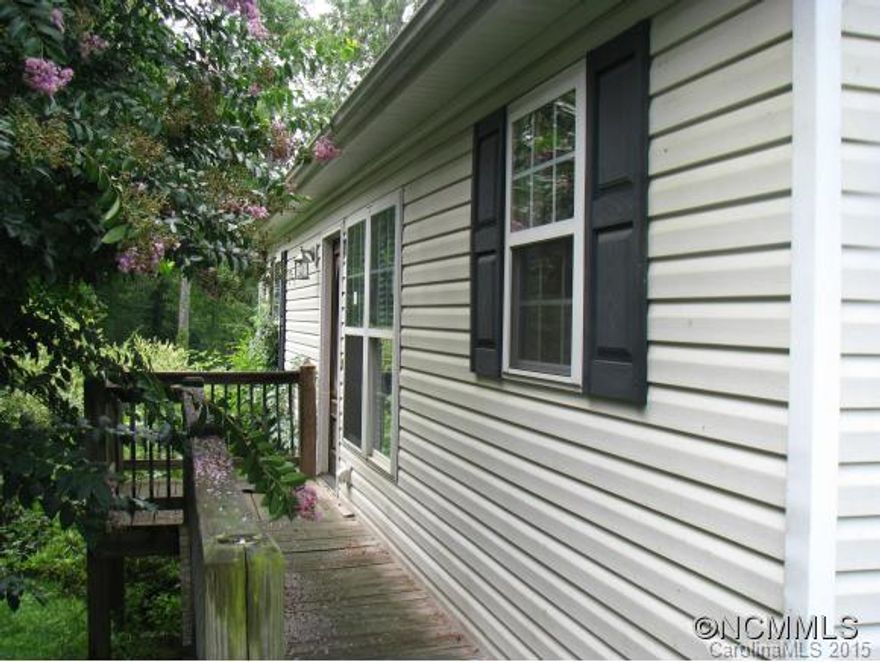 Come home to Hickory Hill at Lake Junaluska. Quiet culdesac location for this 2 Bedroom/3 Bath in main living area, in addition to 2 sleeping rooms upstairs (no closets).Finished basement (with heat source removed), not counted in htd sf could be possible for extra income with 1 Bedroom; Office; Laundry Rm; Kitchen; Deck. Needs TLC. Short sale process.