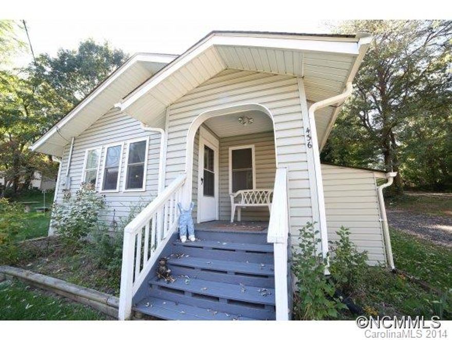Adorable cottage offering convenience at a great value. Walk to the bus stop for outings, spend time gardening on the large .42 acre lot, or cozy up near the fireplace in this well kept home. Open living space flows well and boasts a 200+ sqft three season room not included in sq footage. Possible 3rd bedroom and hardwoods under the carpet per the seller. Newer roof, new windows, and many more upgrades. Come see this house before it's gone.