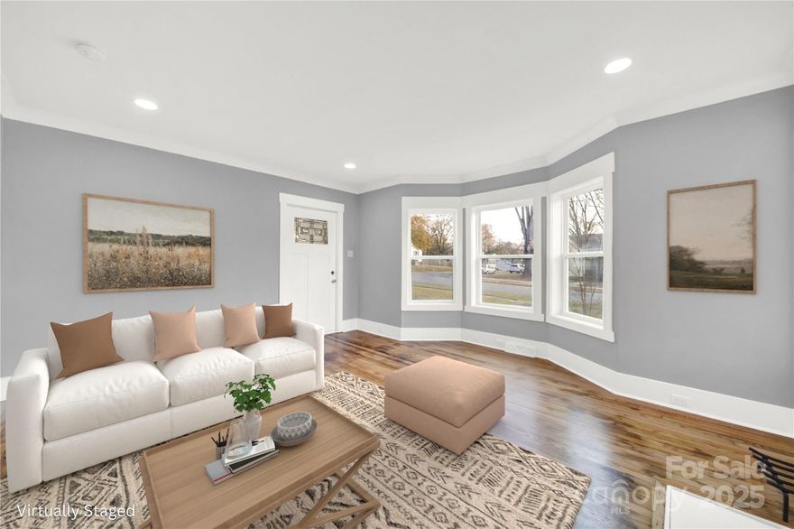 This turnkey Rock Hill gem is renovated and packed with upgrades. Think new everything—roof, gutters, siding, windows, HVAC, plumbing, electrical, paint, and doors throughout. The restored hardwood floors shine, while the eat-in kitchen boasts all-new appliances, cabinets, countertops, and a chic tile backsplash. The bathroom has been completely updated including a gorgeous white subway tile surround. Even the laundry room got a full makeover! Bonus features include 5-inch molding, recessed lighting, and ceiling fans for that modern touch. Outside, enjoy privacy with a fenced backyard. Home is walking distance to everything downtown Rock Hill has to offer including the fountain park, shopping, restaurants, breweries. And, a very short drive to Winthrop University and the Sports Complex and an easy commute to I-77.