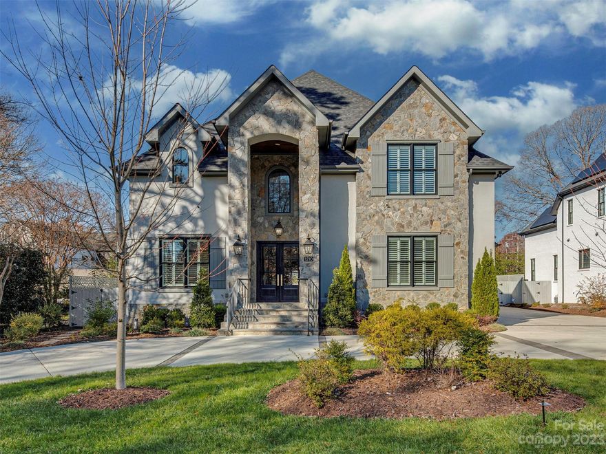 MODERN LUXURY + FUNCTIONALITY IN SOUTH PARK! This gorgeous transitional plan boasts 5800+SF, 6 bedrooms and 6.5 baths. THE MAIN FLOOR: presents 10ft ceilings, luxury wood flooring, recessed LED lighting and incredible natural light. The centerpiece gourmet kitchen features a huge island, glowing quartz countertops, extended cabinets, and walk-in + butler's pantry w/wine bar! High-end stainless appliance pkg complete w/ WOLF double-door fridge, 48” cooktop/double oven, Sharp microwave drawer, and wine fridge. MAIN LEVEL PRIMARY SUITE features Italian marble countertops, soaking tub, frameless glass shower and custom closet. UPSTAIRS: five generous bedrooms w/full baths, a huge bonus room w/fireplace and addt’l full bath. OUTDOORS: Walk-out from main rooms or master to stoned porch w/fireplace and lovely landscaped grounds featuring an in ground pool w/retractable cover, jacuzzi, and outdoor kitchen. Circular drive, 3 car garage and 2 addt’l parking spaces. MUST SEE UNPARALELLED CHARM!