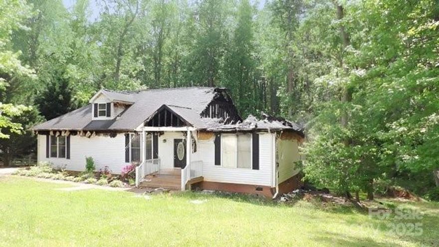 Opportunity knocks!  Fire has damaged this property and I am not sure what may be salvageable.  There is well and septic for the property.   Located in the back of the SD on a quiet culdesac.  No access.  The property must be listed in the MLS systema minimum of 7 days before any offer is accepted.