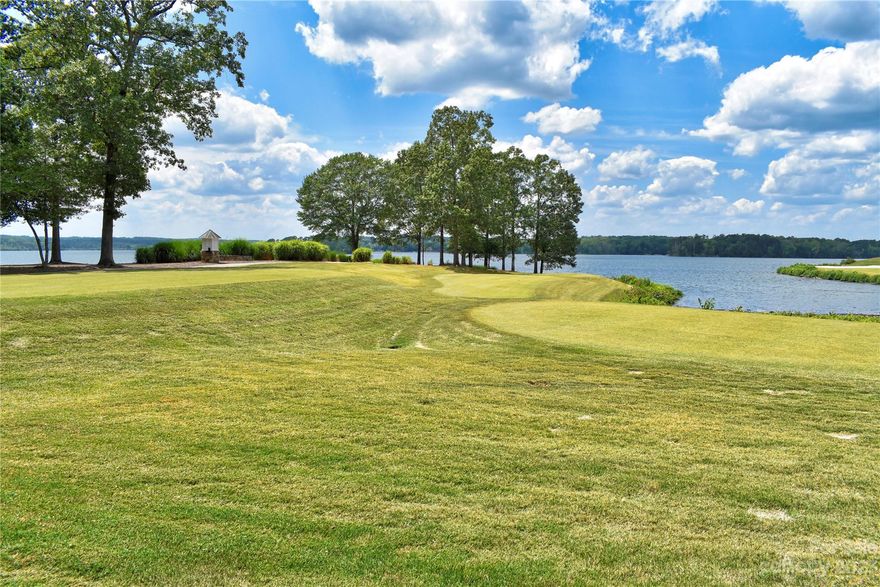 This Badin Lake water view lot is located in the prestigious golf community of Uwharrie Point. Prime estate property along the back 9 of the golf course. Level 1.67 acre lot in the very desirable Southpoint neighborhood. Ask the Listing Office about the rare opportunity to purchase the adjoining lot to create an even larger estate property. Unrivaled sunset views of Badin Lake. Priced below tax value. Underground power & internet. County water & sewer available. Within walking distance of the club's amenities. This gated community is complete with 24 hour security, highly rated golf course, marina, club house, restaurant, pool, tennis courts & more. Club opportunities require membership. Come build your dream home in this exclusive neighborhood, within an hour from Charlotte or the Triad. The Uwharrie National Forest 15 minutes away is a great destination for camping, hiking, horseback riding & ATV/OHV trails. Badin Lake offers marinas that provide dining, gas, and watercraft rentals.