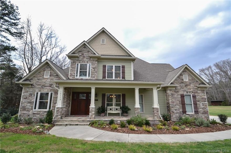 Want country living with city convenience? Look no further! This beautiful custom built home on the quiet edge of Mint Hill is waiting for you to make it your home. House is on 3+ acres of open land that backs up to private woods. The house boasts handcrafted amenities and upgrades from the ground up. From hardwood floors to coffered ceilings, this house is a gem. Side load garage is an oversize 2 car.  Detached garage can be used as a workshop and already has plumbing hooked up. Don't miss out!