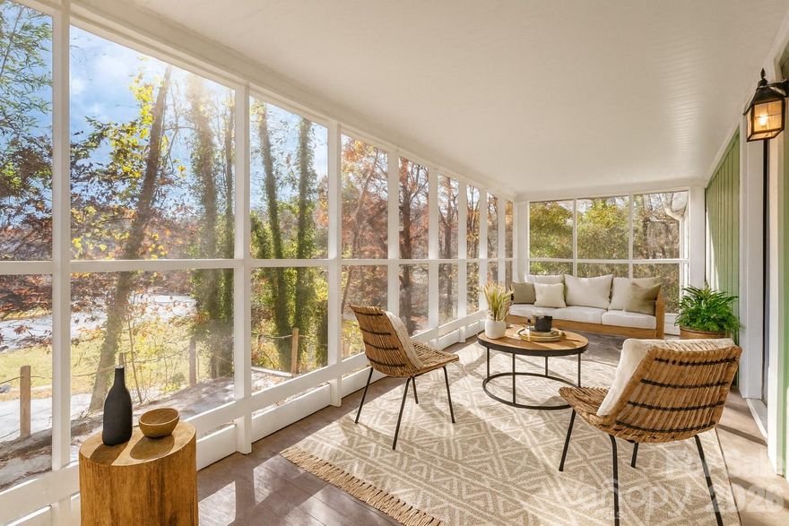 MOVE-IN READY! Discover this charming and totally refreshed 2 bed, 2 bath home perched above the road, offering a treehouse-like feel and exceptional privacy — all just steps from Morse Park, the former Flowering Bridge park, and the Lake Lure Marina! Talk about prime location! Situated on Boys Camp Rd, this home enjoys stunning tree-lined views along with glimpses of the mountains and sparkling water peeking through the trees.

Just minutes away, enjoy a variety of Lake Lure eateries or head 1 mile toward Chimney Rock to explore Chimney Rock State Park, scenic hiking, delicious restaurants, quaint shops, and some of the most breathtaking views the area has to offer.

Inside, you’ll find a roomy primary bedroom, a second comfortable bedroom, and a beautifully updated bathroom featuring a cozy cast-iron clawfoot tub. The gourmet chef’s kitchen showcases an oversized island and stainless steel appliances—including a range, built-in microwave, and dishwasher—making meal prep and entertaining effortless.

This property also shines with its outdoor living spaces. Relax around the extra-large fire pit area, unwind on the oversized screened-in porch with stunning views, or soak up the stunning 360-degree views from the side deck. Take in the mountain vistas and fully immerse yourself in the surrounding flora and fauna from every angle.

This home features a new roof (installed 2025), new floors (2025), newer HVAC (2024), foundation upfits and so much more!

Don’t miss this unique opportunity—a peaceful, private retreat with unbeatable access to Lake Lure’s best amenities, and NO HOA. This quaint hillside cottage with impressive views can serve as your primary residence, weekend getaway, or a fantastic investment retreat. Additional .33 acre parcel behind the property to convey with an acceptable offer.