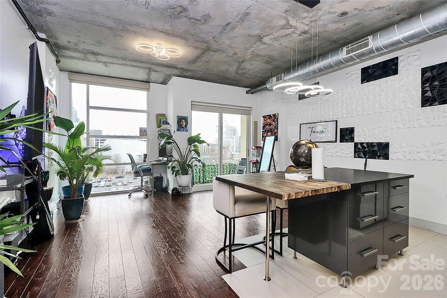 Wake up to Charlotte's skyline. This isn't just a condo, it's your front-row seat to urban living at its finest.

Perched on the 8th floor of Courtside, Unit 803 commands panoramic city views through floor-to-ceiling windows that flood this sanctuary with light and possibility. Modern industrial design meets luxury finishes in a space that feels like a curated gallery of contemporary living.

The Details Matter: Recently renovated bathroom with designer dual LED mirrors, premium fixtures and a Bidet. The HVAC system (installed 2 years ago, still under warranty) keeps you comfortable year-round. Energy-efficient LED lighting throughout the living room and bedroom, no outdated fixtures here. 

The Location is Everything: Steps from Spectrum Center, 7th Street Market's vibrant food scene, and Charlotte's most coveted restaurants. This is First Ward—where urban professionals, creatives, and tastemakers live. 24/7 secured building. Rooftop terrace. Assigned parking. Everything you need. Nothing you don't.

Move-In Ready. Warranty Covered. Investment Grade. This is the urban loft you've been imagining.