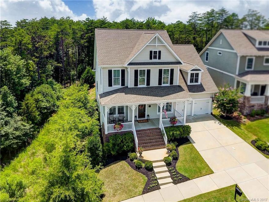 Beautiful David Weekley Quality Home, Wonderfully Flowing Walling Plan in Baxter Village! PRIVATE Screened Porch! Gorgeous Gourmet Kitchen w/island, bar & breakfast area. Premium granite, cabinetry & lighting. Dining Room & Butler's pantry. Luxurious Master Suite AND Guest on main. Amazing Master Shower! Three BDs upstairs + Bonus Room/Media Room or could be 5th BD. Welcome Home to the active community of shops, restaurants, festivals, library, parks, & more. Fort Mill Schools. Minutes to I-77.