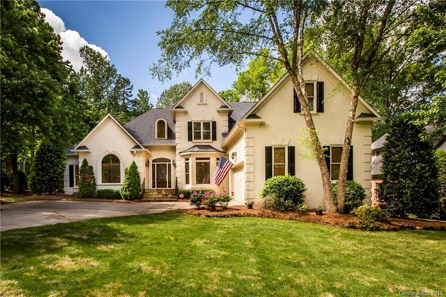 Just reduced 40K from orig. price. Fresh paint, hardwoods just refinished like new, salt water in-ground pool. Master on the main floor. Renovated Kitchen (2008) w/ SS appliances, New cabinetry, wine and beverage chillers, granite counters, and oversized center isle. Master bath has been renovated. Exceptional in-ground pool w/ hot tub in rear surrounded by elegant stone work. Fairly new items as follows:  roof,  pool pump,  HVAC, gutters, hardwoods on both levels,  bonus to selling agent!