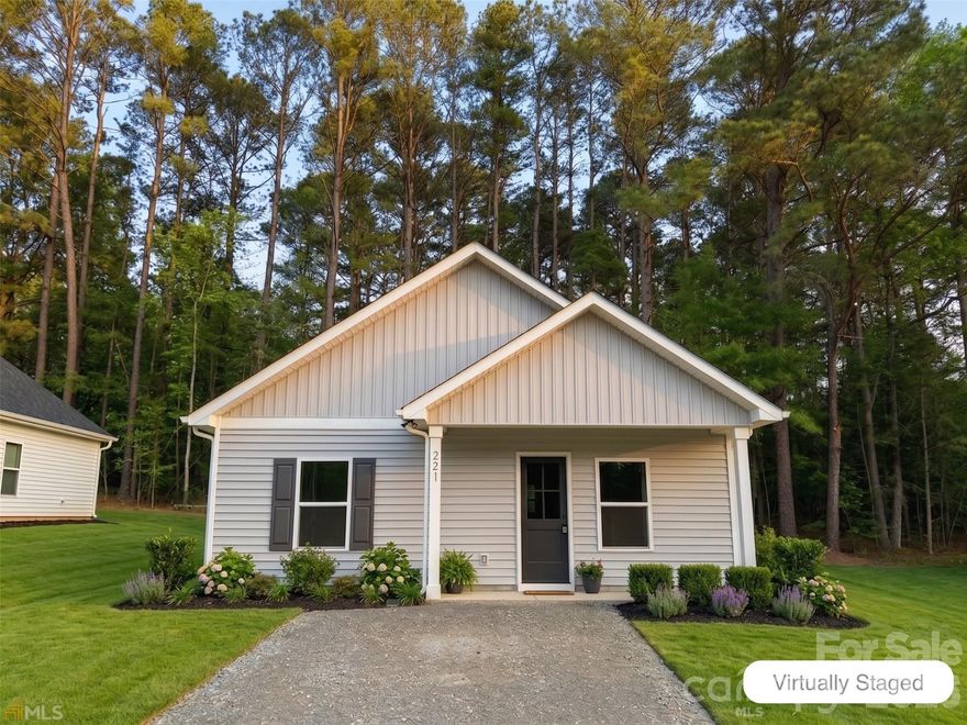 New Construction UNDER $200,000. Discover the quality of a brand-new, site-built home. This single-story residence is designed for low-maintenance living with a durable vinyl exterior and an architectural shingle roof, and slab foundation. Modern comfort is assured through central heating and cooling, complemented by the reliability of city water and sewer services. One of the greatest advantages of this property is the absence of a homeowner's association, offering you more freedom and flexibility. Nestled in the heart of Norwood, this home places you in a peaceful, small-town atmosphere known as the "Gateway to Lake Tillery". The town offers a vibrant community spirit with easy access to pristine shoreline activities, local boutiques, and the scenic beauty of the surrounding Uwharrie region. This property is an exceptional find for anyone seeking a serene lifestyle paired with modern convenience.
