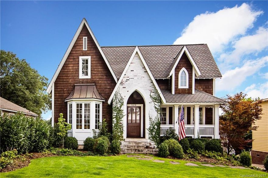 Custom built Dilworth home with 2 Master BR - one on main. Chef’s kitchen. Refinished dark stained oak HW's throughout. Gorgeous bath renovations in 2017. Pool (45x20') featured in Clt Urban Home & covered patio added under deck w/beautiful gas fireplace creating 2 levels of indoor/outdoor living (2015). Walk-out basement w/half bath, rec room, storage, 1 car garage. Views of city skyline. Rear yard has access to Springdale Ave creating a sense of space & increased access to parks & restaurants.