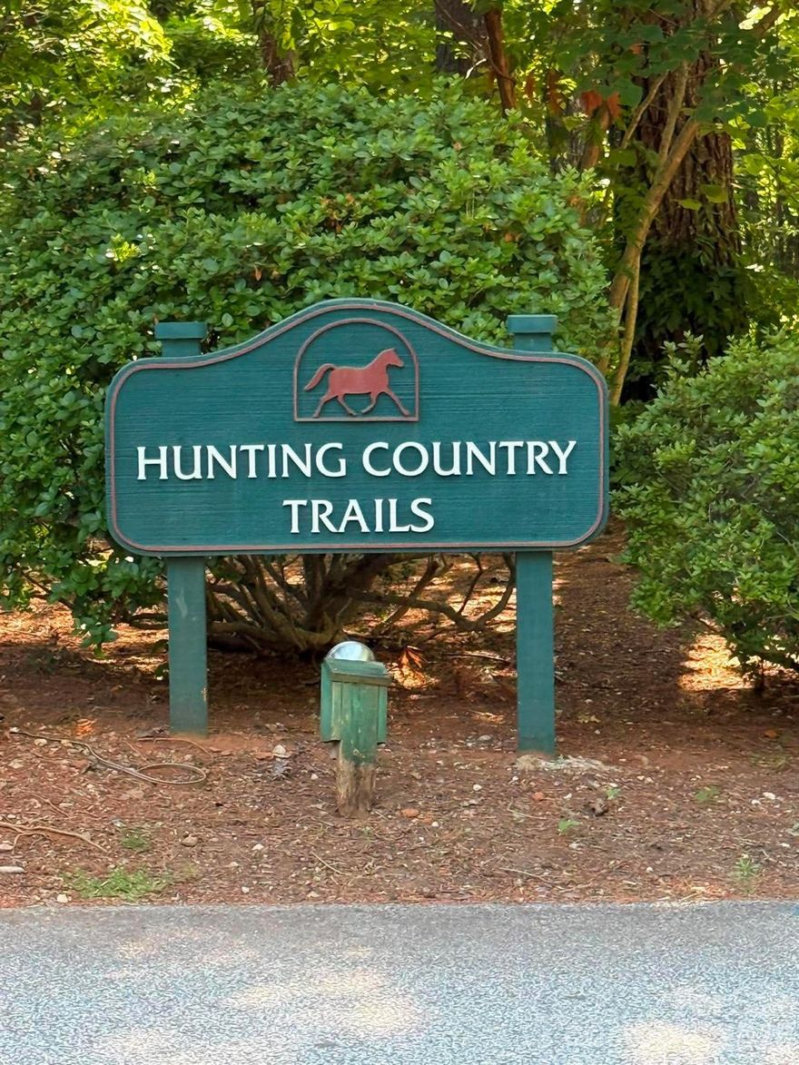 Townhouse in sought-after Hunting Country community, Polk County. This 3-bedroom, 2.5-bath home at 2 Hunting Country Trail offers low-maintenance living in one of Tryon's most sought after neighborhoods. Featuring approximately 2,546 heated square feet, the layout provides spacious living areas and comfortable accommodations throughout. Whether you seek a primary residence or second home this property offers flexibility to suit various needs. It is conveniently located near downtown Tryon, area equestrian venues, and the FENCE trail system, with easy access to dining, shopping, and outdoor recreation.