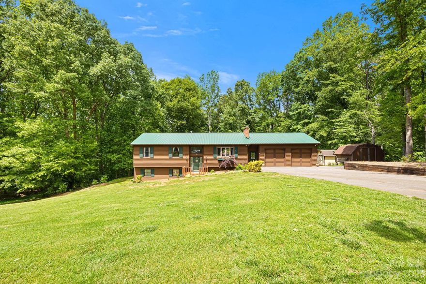 **Multiple offers received. Please present highest and best by Monday 5/8 at 2PM.**
You have been looking for a split level home on almost an acre with privacy and no HOA and you have found it! This lovely home has been renovated to include an updated kitchen, tile backsplash, 12mm Mohawk laminate water resistant flooring throughout, new paint, new marble countertops in kitchen, new lighting, and tastefully updated. Upstairs features a living room, kitchen, dining room and 3 bedrooms. The main level primary has a full bath and a private deck. With 2 primary rooms, you can choose which level to be on. If you choose the lower level primary, you have a sliding glass door to take you right out to the backyard and concrete patio. Lower level also includes a rec room, wet bar, laundry room, and office. Tons of space and very private. 2 sheds remain with home.  Sellers are both licensed real estate agents in NC. One seller is also licensed in SC.