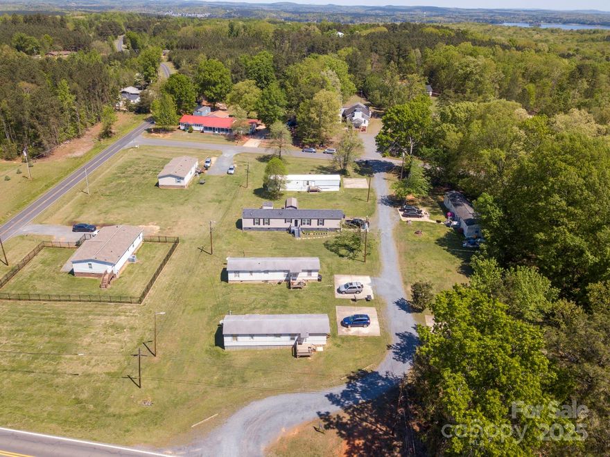 This listing consists of  a mobile trailer park with (6) pads and four single wide trailers.  It is an excellent investment opportunity.  Seller has owned for more than (1) year and would like to sell preferably to investor.  Tenants are responsible for all utilities,  Owner pays lights for light pole that provides light for trailers.  Currently (5) of the (6) pads  are occupied with trailers.  The seller owns four of the trailers on lots 1,2,4, and 5.