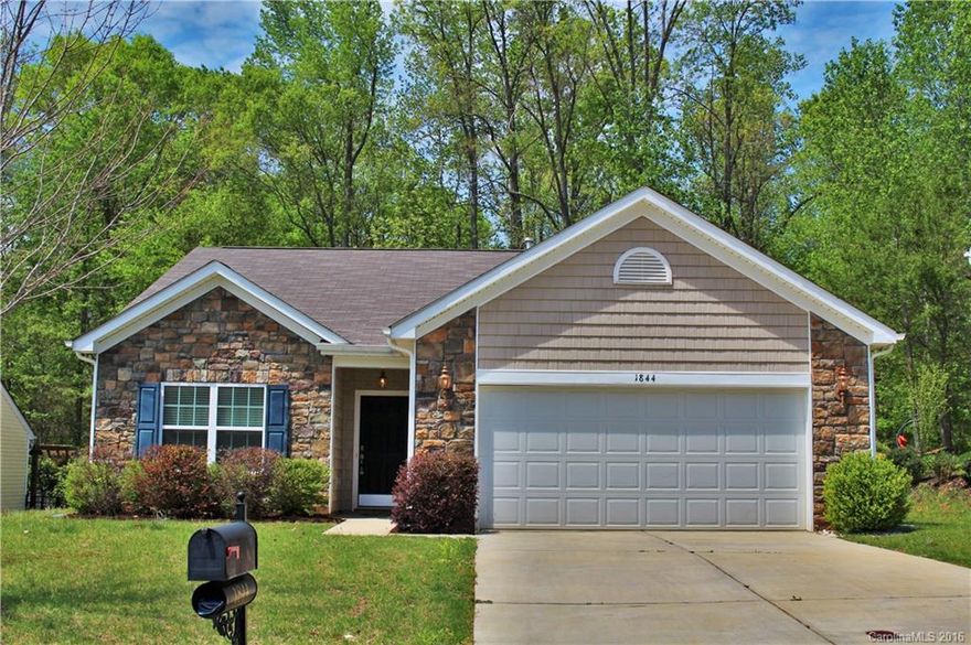 HARD TO FIND Ranch in Desirable Mill Creek Falls! Large Open Kitchen with Beautiful Gleaming Granite Counters~ Under Cabinet Lighting & Breakfast Bar~Opens to Bright Sun-Filled Sunroom that Overlooks Oversized Patio and Private Wooded Lot w/NO Homes Behind! Great Room w/ Vaulted Ceilings & Gas Fireplace~ Separate Office w/Double Doors~Master w/Walk-in~So Much to Offer in This Great Community w/Clubhouse/Pool/Tennis/Walk Trails~All in Award Winning Clover Schools!