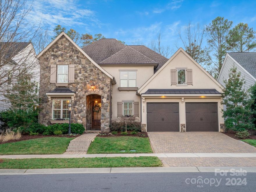 Gorgeous home with impeccable design features await!Stackable slider doors in great room open to screened porch & pool to create an unparalleled layout.Impressive saltwater pebble tec pool with waterfall,heater,programmable underwater lighting & travertine decking.Enter thru a stunning stone alcove into an appealing foyer and overall house plan that makes efficient use of space with open kitchen,large bedrooms,multiple spacious walk in storage spaces,flex room on main with space for office,playroom etc,front room for exercise,coffee,wine.Gleaming 5” Hardwoods.Owner’s Suite on main delights with serene spa bathroom, expanded shower, walk-in closet conveniently attached to laundry room.Large second primary bedroom overlooks pool and flowering landscapes.Low voltage site lighting,front & rear.Downspouts tied into french drainage system.Irrigation system with separate meter.All thoughtful features and plan uniquely designed for privacy,entertainment,sun lounging & exceptional daily living.