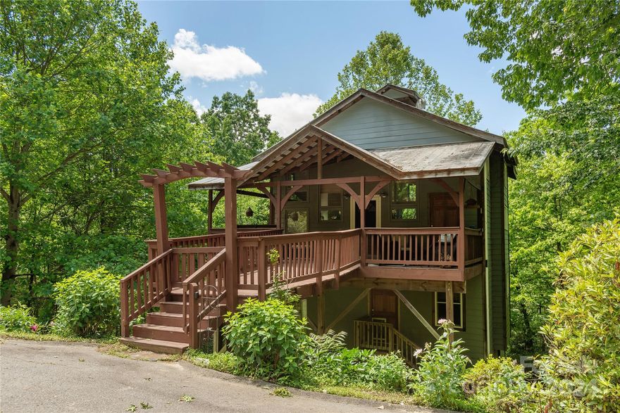 Picture the feeling of living in a Tree House, surrounded by a forest, birds, and winter mountain views. STR's allowed.  This home can be whatever you want it to be: full time living, vacation rental, weekend getaway. Enter into the Big Open Cathedral Ceiling Living Room with open kitchen floor plan, also has an additional loft area to hide out in. Seller converted 1 bedroom home into 2 bedrooms with Den (which can be a third bedroom but due to window height restrictions is a den), all with closets and additional mini splits.  Floor plan is attached. Walk in Area for storage and room to finish as well.  Fenced in yard area for pets or kids to roam.  Come sit on the porch and enjoy the peaceful sounds of nature! Seeing is believing...Easy Access to downtown Asheville and Town of Black Mountain.