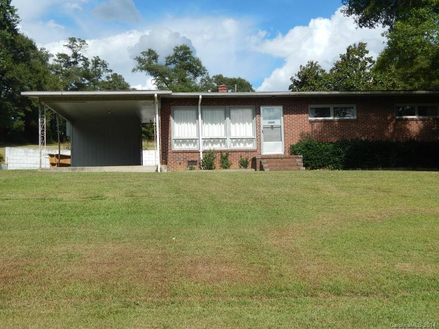 Great property at a great price. This home is sitting on 3 beautiful acres. Country setting near interstate. 3 stall barn and green house, horses allowed