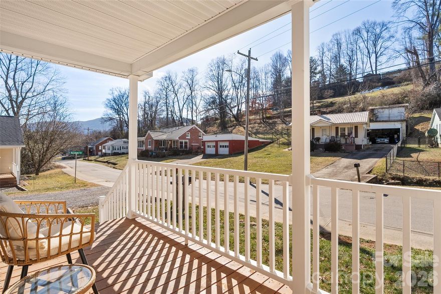 Where modern living meets mountain charm. Just a short walk to Frog Level and downtown Waynesville, this beautifully updated home offers convenience, style, and views. Enjoy sweeping mountain-top scenery from the front porch, perfect for morning coffee or evening sunsets. Inside, you’ll find a modern design that feels fresh and functional, while the fenced-in yard provides privacy and space for pets, play, or entertaining. A rare combination of walkability, slight views, and contemporary comfort in the heart of Waynesville. MOTIVATED SELLER. Come and see the home and all it has to offer.