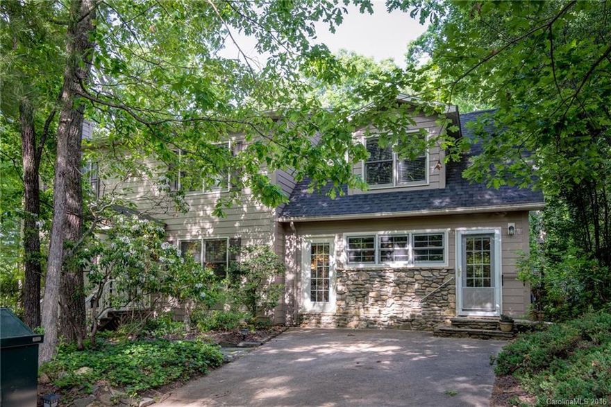 Great location near town, Lake Tomahawk and golf course. Private fenced in backyard with gardens , walkways, stone patio, gazebo.  Adjacent lot included in listing. Nice home with open floor plan. Living room and study. Wood fireplace.