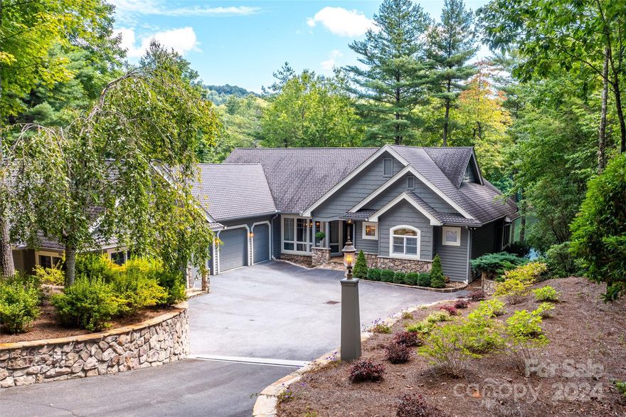 Very private approach to a wonderfully laid out custom designed home with loads of room yet with a cozy feel. Over 200 feet of easy level lake access with stone seawall, boat slip and stone patio with a firepit for lakeside entertaining. Features include a gourmet kitchen with full size Subzero fridge and freezer, Thermador range, GE double ovens and granite topped wet bar. Main level features a more than generous primary suite with two large closets and separate guest suite. The house has 4 fireplaces (2 wood/2 gas), cozy sun porch and private office. There's a 1000 SQ. FT. independently heated/cooled game room.  Beautifully landscaped yard can be accessed from both the upper and lower levels. And for the dog owner, there's a fenced side yard. The lower level features a great room and two spacious bedrooms. To complete the package there's loads of storage, an encapsulated crawl space and generator.