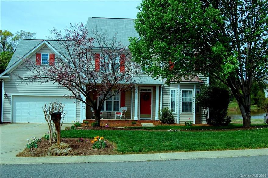 Bring your fishing poles! Traditional floor plan with formal living room that can be an office/study and formal dining.  Open kitchen with eat-in breakfast area and family room.  Laundry on main floor and attached two car garage.  Large deck that opens out to a gorgeous view of neighborhood pond and fenced back yard.  You will love this location!  A-rated schools.  All bedrooms and bonus room upstairs. Master suite features a sitting area. Great house!  Great price!