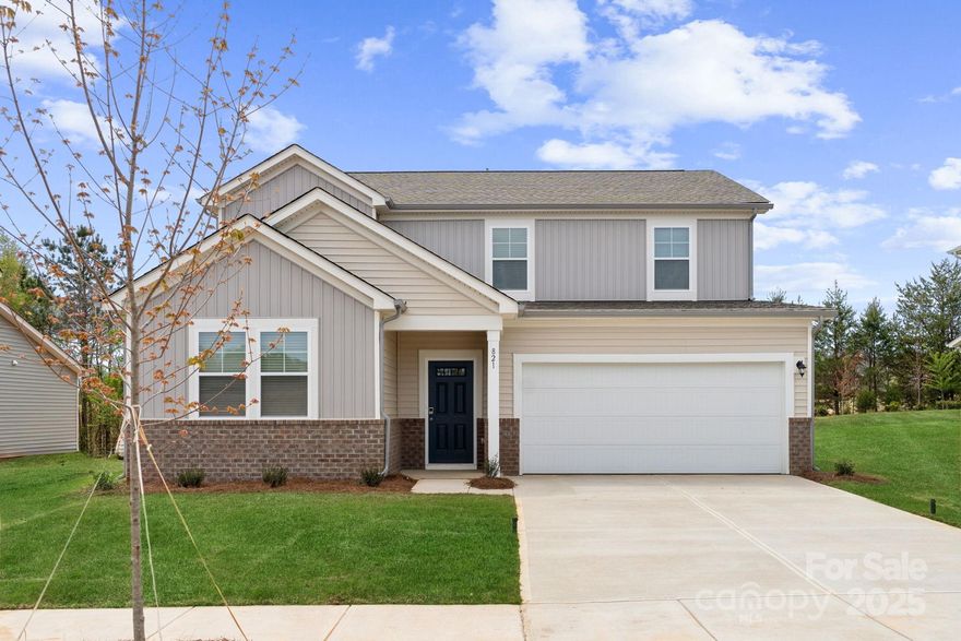 Welcome Home! Boasting 2570 heated square feet, this spacious and beautifully designed home features 5 bedrooms and 3 baths, with two bedrooms and a full bath conveniently located on the first floor. The open floorplan creates a warm and inviting atmosphere, perfect for hosting gatherings with family and friends. The kitchen is a chef's dream, complete with quartz countertops, a large island, and top-of-the-line appliances. Cozy up by the electric fireplace on chilly evenings and enjoy the peaceful sanctuary of the primary bedroom with its luxurious bath and spacious walk-in closet. Built by one of the top ten builders in the country, you can trust in the quality and craftsmanship of this stunning home. Located in a desirable neighborhood with a community pool, dog park, playground, and activity field. Don't miss your chance to make this dream home yours!