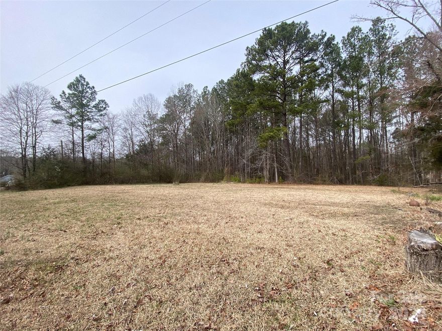 Stunning 1.5-acre corner lot, fully prepared for construction. Power, septic, and water connections are already in place. Whether you envision building the home of your dreams, having a manufactured or modular home, this lot is ideal for you. Experience the epitome of country living on this exquisite land.