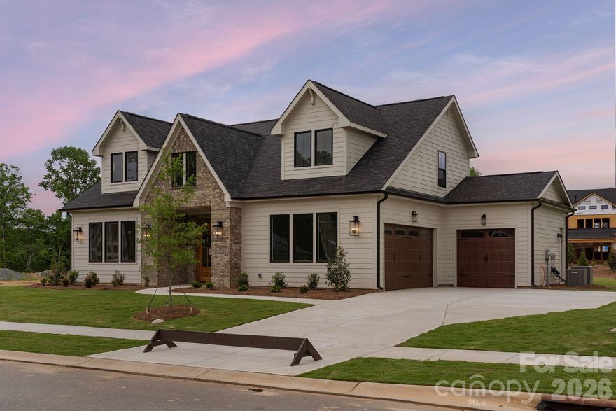 Unwind in luxury with this exquisite 3,665-square-foot home. The expansive primary suite, located on the main level, features a spa-inspired bathroom w/ a luxurious floating tub & an oversized dual-head shower + rain head. The main floor also houses a well-appointed secondary bedroom. Additionally, a versatile office space on the main level ensures that working from home has never been more stylish. This home features an open floor plan, seamlessly connecting the living areas. A chef's kitchen, equipped with top appliances and a generous island. A scullery/pantry with sink, dishwasher and beverage fridge makes hosting a breeze. Upstairs, 2 spacious bedrooms with walk-in closets offer ample storage. Entertaining extends outdoors with a covered patio w/fireplace, ideal for alfresco dining or relaxation. With easy access to Wesley Chapel's vibrant hub of shopping and dining, this home truly represents the pinnacle of affordable modern luxury living. Tour our model and design center & ask about our great lending partner incentive!