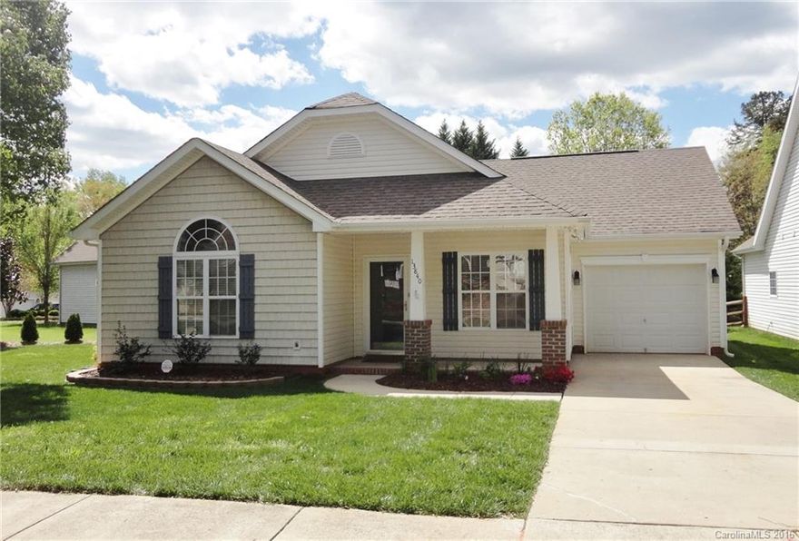 Adorable ranch home with split bedroom floor plan.  Large master suite with walk-in closet and private bath.  Kitchen has solid surface countertops, tile floors and wood topped island.  Great room features vaulted ceiling, lots of windows and cozy fireplace and laminate floors.  Great location in beautiful community.