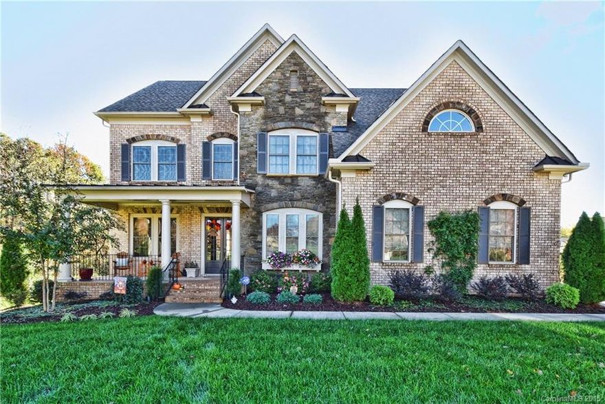 DESIGNER Home/AMAZING Upgrades! "Woods" Enclave-BridgeMill! Spectacular Stone/Brick home w rocking chair porch, cul-de-sac. Prof. landscaped/fenced 1/2 ac. Outdoor area: woodburning FP, Kitchen, Travertine patio & screened porch overlooks Natural area!  Pristine interior -H/W flrs, oversized granite islnd, SS appl, Sunroom. 1st fl guest suite/full bath! 2nd fl. Master Retreat w spa bath/ two WIC. 3car garage. 3rd fl-add'l 1,069 future bonus/bed/bath!  Ammenities-pool/tennis/club/playgrnd/trails.