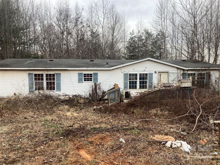 1997 Manufactured home 3 bedroom 3 bath. Sold as is where is. Seller to make no repairs. No active heat source. Seller makes no representations and does not know if the well and septic are in working order.
