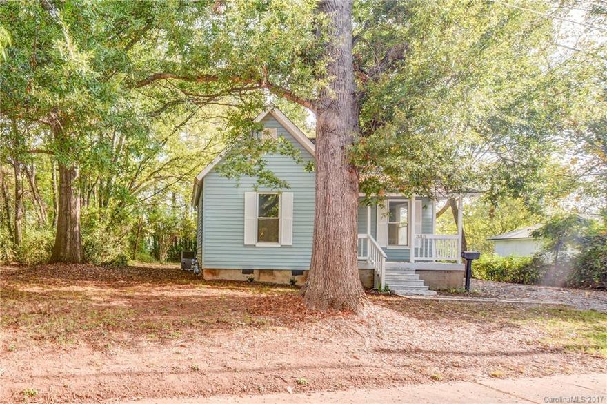 Fall in love with this stunning newly remodeled home! New Paint! Beautiful refinished hardwood floors. All tile bathroom and kitchen. Like new carpet in second bedroom! Granite counter tops and custom cabinets in Kitchen that opens up to a large deck with great wooded view. Brand new HVAC system installed in 2017. Roof installed in 2016. Enjoy sitting on your covered front porch! Beautiful home inside and out.