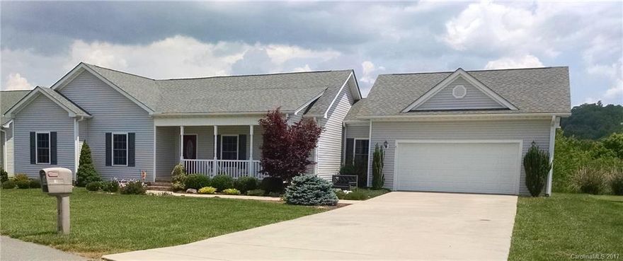 Extremely well maintained home w/2car+ garage, Has wonderful mountain views. Riverwind a 55+ active community w/pool & hot tub has a monthly calendar of events. A PERFECT PLACE to make new friends. Home has a lge. Sunroom overlooking the mountains and has 0 neighbors behind you. Master suite is perfect w/a walk-in closet and bath that has 2 sinks & a walk-in shower. Great walking with a park, stores and restaurants close. Half way between Brevard & Hendersonville. Both have great seasonal events