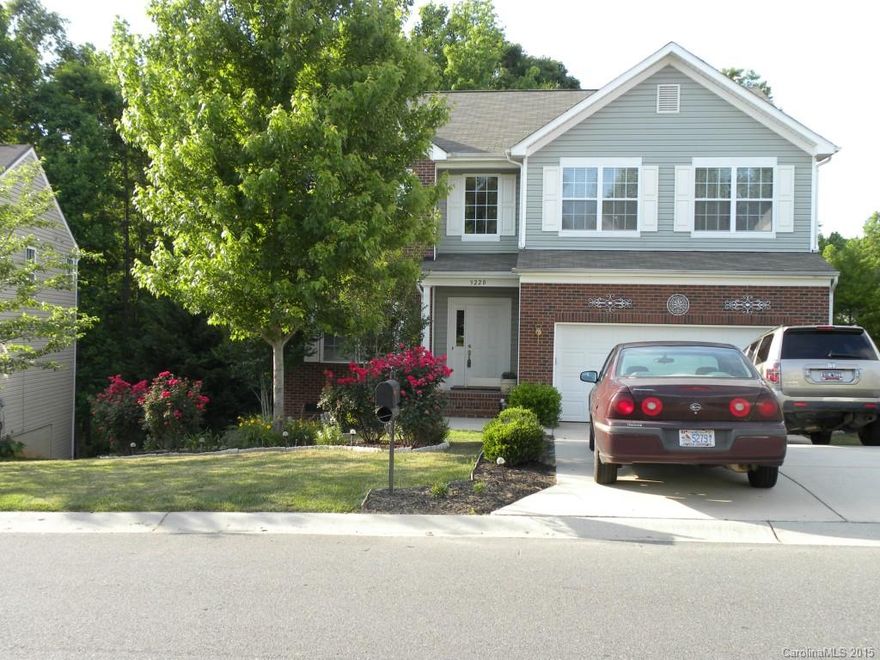 MOVE IN READY four bedroom, two and a half bath home with an upstairs loft.  Home also has updated carpet (25 year transferrable warranty) and paint, hardwood floors throughout main level.  Kitchen has granite counter tops with stainless steel appliances, gas stove and oven with 42" cherry cabinets. Large deck and patio that is great for outside entertaining. Oversized closets and a lot of storage. Newer roof (2011). Hot tub does not convey