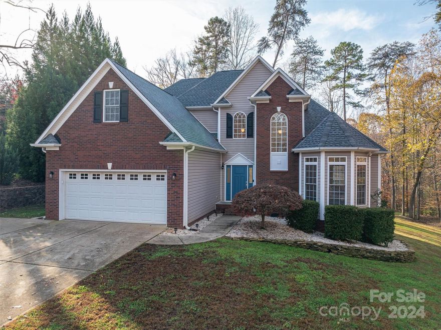 Beautiful and private home on an estate sized lot surrounded by trees at the back of a quiet cul-de-sac in a small upscale community! Looking to avoid the "cookie cutter home"? This is it! The large great room features hardwood floors, vaulted ceiling and fireplace. Well equipped kitchen with eat at/serving bar, granite, gas cook top, pantry, wall unit with oven and microwave, & warming drawer. Refrigerator, washer & dryer will convey. There is also cozy keeping room/den off kitchen. Spacious main level primary suite has sitting area, whirlpool tub with separate shower, double vanity and walk in closet. Upper level offers two additional bedrooms and a large 4th bedroom or bonus over the garage. New roof installed in 2022. Location location location! Less than 3 miles to I-85 and minutes to shopping & restaurants & hospital.