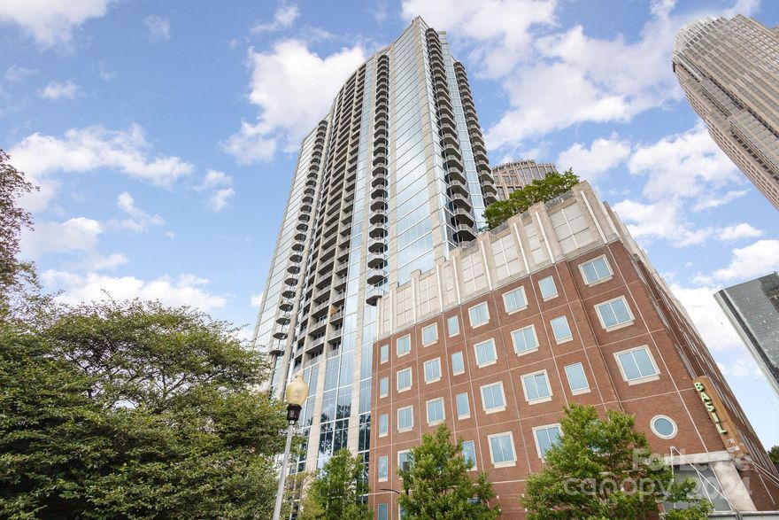 Discover urban luxury living at one of the few 2 bed, 2 bath condos in the highly desirable Avenue Condominiums. This exceptional unit features granite countertops and stainless steel appliances, combining elegance and modern convenience. Enjoy breathtaking downtown views from your private balcony, perfect for relaxing or entertaining.

This condo comes with 2 assigned parking spaces, providing added convenience in the bustling city. The Avenue Condominiums offer a host of premium amenities, including a concierge, fitness center, swimming pool, club room, business center, grilling area with fireplace, and much more.

Located in the heart of Uptown Charlotte, you'll be just steps away from the Panthers Stadium, Spectrum Center, top-notch restaurants, vibrant parks, intriguing museums, and a plethora of entertainment options. This is urban living at its finest!

Don't miss out on this unique opportunity to live in one of Charlotte's premier addresses.