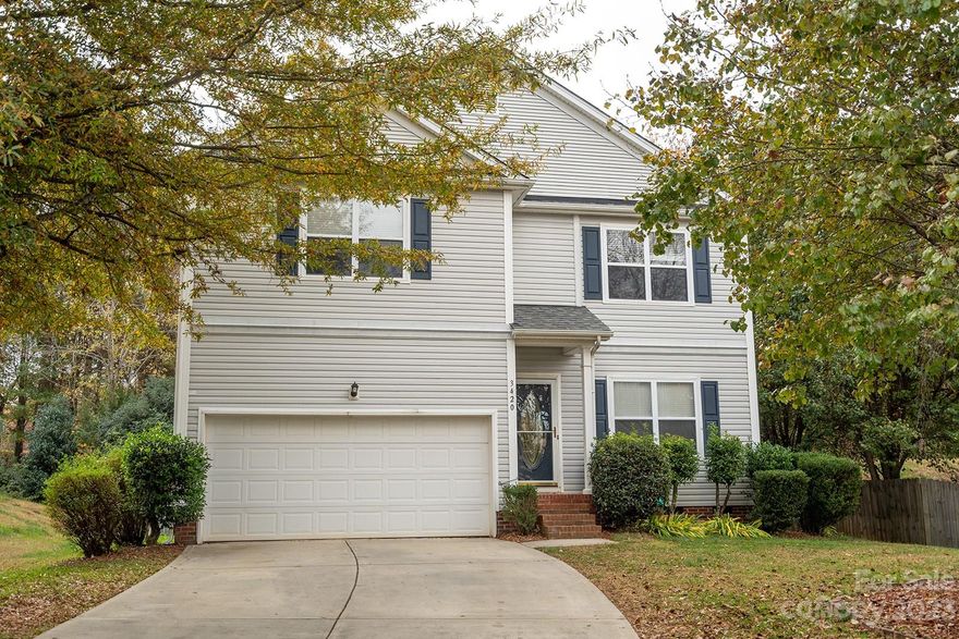 This beautiful home, located in the charming town of Fort Mill, offers a perfect blend of comfort and convenience and is one of the largest lots in the community. Inside, you will find an open and inviting floor plan featuring a spacious living area that seamlessly flows into the dining area, making it ideal for both casual family meals and formal gatherings. The kitchen features Granite countertops, high-end stainless steel appliances, ample cabinetry, and a convenient island to provide extra workspace. Upstairs, the HUGE master suite offers a private retreat with a massive walk-in closet and an en-suite bathroom complete with a jetted whirlpool tub and double vanity. There are two more generously sized bedrooms. The loft has been enclosed for home office/ flex space/craft room/ playroom. Outside, the property boasts a large backyard with a patio and spacious, partly covered deck with a screened in porch. Check out the virtual tour here: https://my.matterport.com/show/?m=p36XtXBz4R8