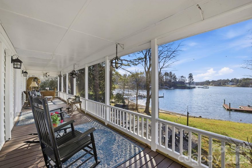 MULTI-MILLION DOLLAR LONG RANGE SUNSET VIEWS! NO HOA! Gently sloping lot to lake! Large circle drive! Stone steps to private sand beach area! Easy walk to your large private dock with boat slip! This charming beautifully decorated lakefront brick ranch comes with over 124 feet of deep-water frontage on LAKE NORMAN. Situated on a partially shaded ½+ acre lot in a quiet no-wake cove, this 3BR/2BA home offers DAILY breathtaking SUNSETS and tranquil outdoor living with a large screened porch, walk-out basement, covered patio, firepit area, hammock, and deck with space for a gazebo. Updated kitchen with stainless steel Viking refrigerator and KitchenAid appliances. Other features include a fireplace in living room and cozy den downstairs with woodstove, rec/office area in fully finished walkout basement with smaller second kitchen, laundry, and additional space ideal for guests or entertaining. Copy of single septic permit page doesn't contain bedroom count. Home is cooled w/ mini splits & Heated w/ mini splits & wall heaters. Preapproved buyers welcome!  Schedule your showing today!