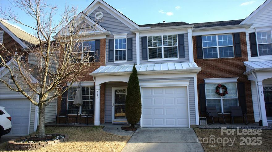 Move-in-ready townhouse in amenity-rich community of Reavencrest! Located in heart of Ballantyne, this 3 BR/2.5 BA townhouse has all the bells & whistles! Excellent OPEN floorplan greets you with a light-filled interior, vaulted ceilings & neutral paint palette, complemented w/ beautiful wood floors on MAIN. Centrally located kitchen w/ upgraded SS appliances, granite countertops & pantry flowing seamlessly into the family room & dining room. Large primary bedroom on upper w/ en-suite bath featuring dual sinks, garden tub, walk-in shower and closet. 1-car garage enters directly into mud room adjacent to kitchen. MUST SEE oversized PRIVATE REAR PATIO w/ retractable awning for year-round use! Washer/dryer included. Enjoy use of the community pool, tennis courts & playground. Excellent Ballantyne location w/ top-rated schools and conveniently located to numerous popular restaurants, grocers, retail shops, and entertainment. **We DO NOT advertise on Craigslist or any SM platforms.