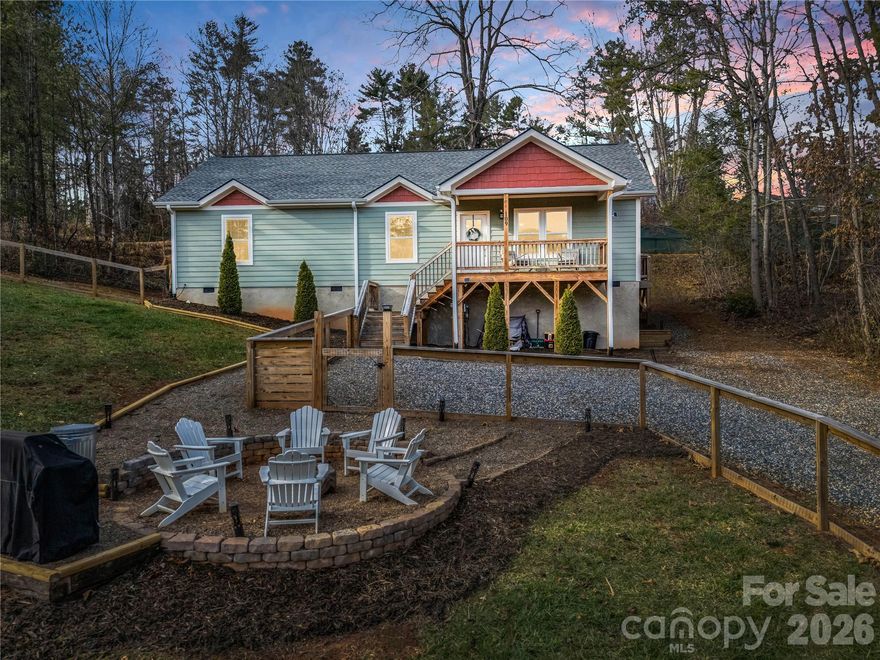 Set on 0.4 acres in the picturesque heart of Western North Carolina, this 3-bedroom, 2.5-bathroom home blends modern design with timeless finishes, offering the perfect canvas for your personal touch. Inside, an open floor plan welcomes you with clean lines, neutral tones, and generous living space designed for comfort and style.

Step outside to a spacious fenced yard, cozy fire pit, and mountain views. Conveniently located near I-26, just 5 minutes from the charm of Weaverville, 15 minutes from Asheville’s vibrant culture, and 30 minutes from both the airport and Hatley Pointe, the region's newest ski and mountain bike resort.

Whether you’re looking for a delightful primary residence or a promising investment opportunity, Elf Haven Lane offers an exceptional lifestyle and endless potential.