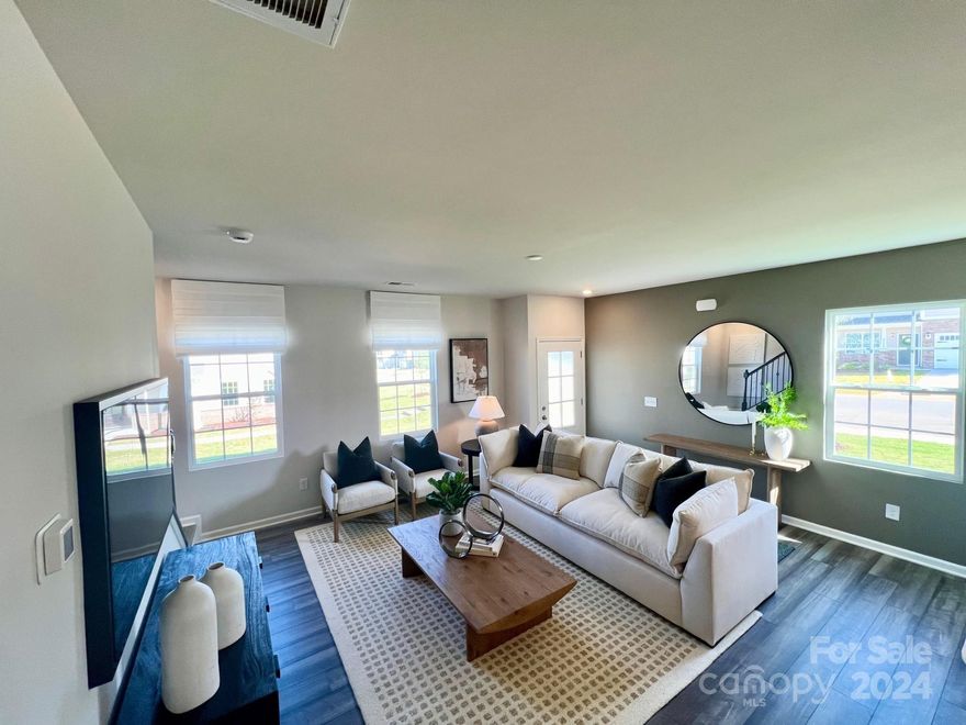 Come visit us in Nolen Farm's newest townhome phase!! Conveniently located near Gastonia and Downtown Belmont, and the shopping and food they have to offer! This amazing community features Trails, a pool, as well as pickleball courts! Our townhomes feature 3 upstairs bedrooms, open concept plans with large kitchen islands, split bedrooms, oversized showers and much more.  Our signature Everything's Included program means you will get Quartz or Granite kitchen countertops, subway tile backsplash, ceramic tile, luxury vinyl plank flooring throughout the main level living area!